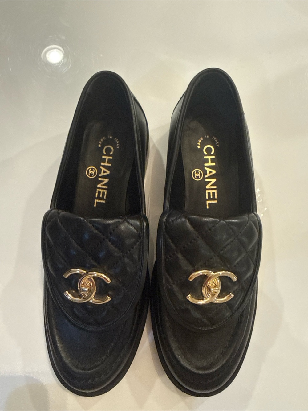 CHANEL Black Leather Oxford Shoes with Logoed Soles